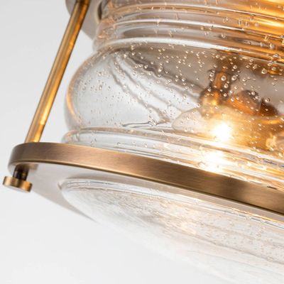 Quintiesse Ashland Bay bathroom ceiling light, Ø 30.5 cm, brass, IP44