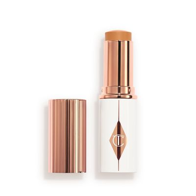 Charlotte Tilbury Unreal Skin Sheer Glow Tint Hydrating Foundation Stick - 10 Tan