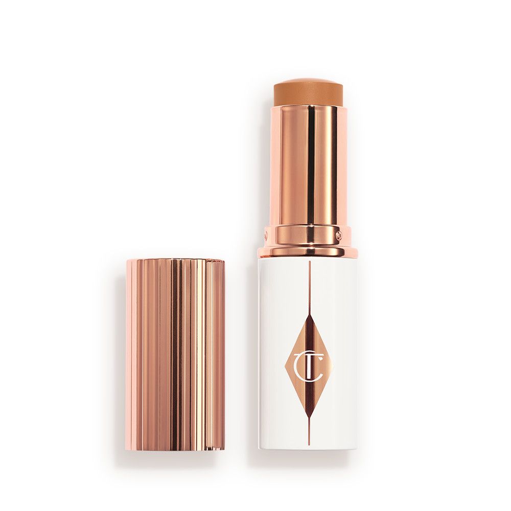 Charlotte Tilbury Unreal Skin Sheer Glow Tint Hydrating Foundation Stick - 11 Tan - Image 1