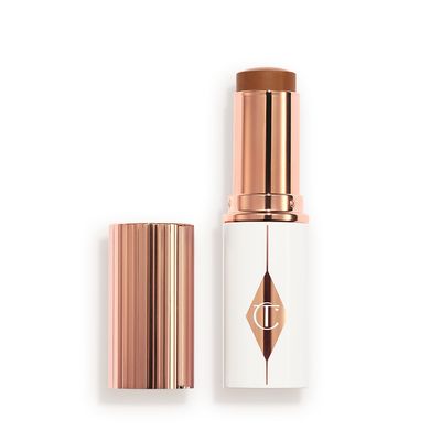 Charlotte Tilbury Unreal Skin Sheer Glow Tint Hydrating Foundation Stick - 14 Deep