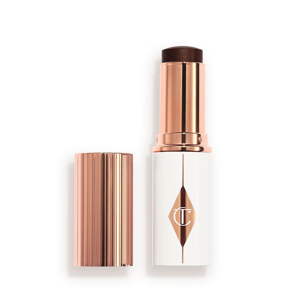 Charlotte Tilbury Unreal Skin Sheer Glow Tint Hydrating Foundation Stick - 17 Deep - Image 1