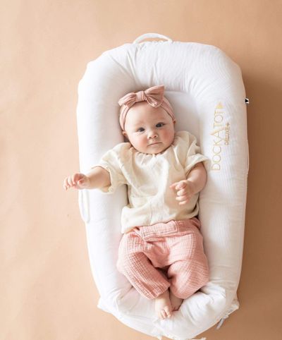 DockATot Deluxe+ Dock - Pristine White | Newborn Baby Nest 0–8 Months | Lounger for Babies | Safe Cuddling, Tummy Time &amp; Diaper Changes | Play Bed