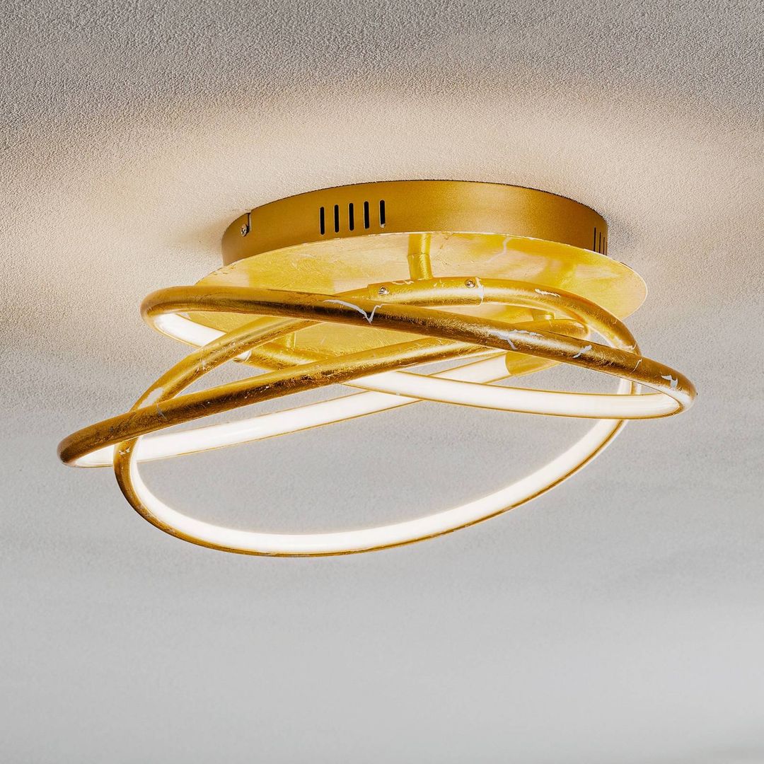 Globo Barna - an LED ceiling lamp in a golden design - Image 1
